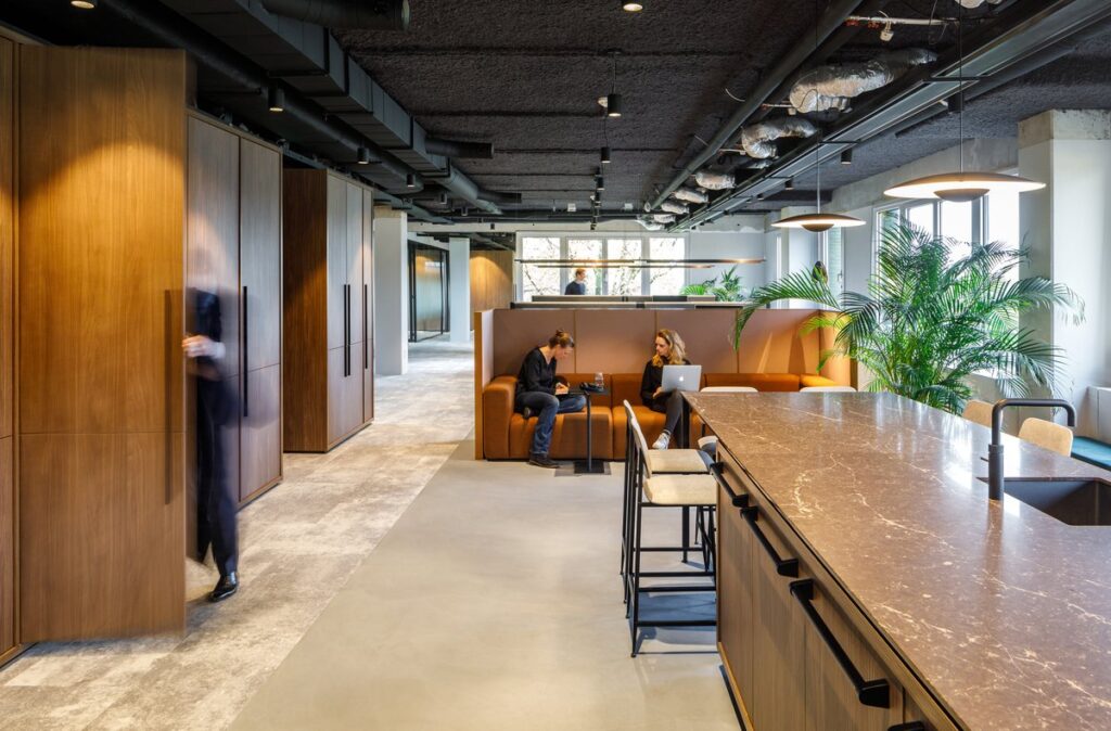 Interior design with exposed concrete columns and warm natural materials