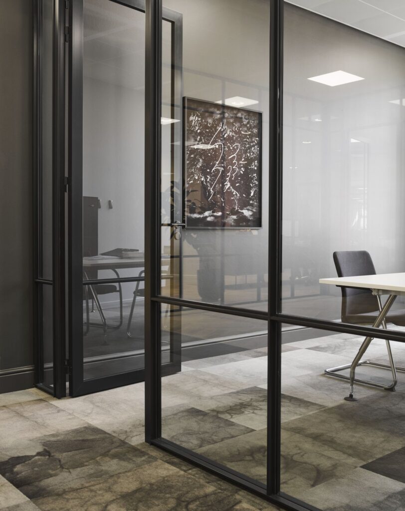 Meeting centre with gold painted walls and artworks.
