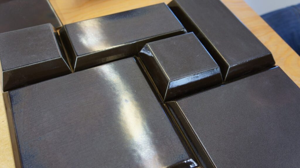 Close-up of unique tiles in Havengebouw Amsterdam