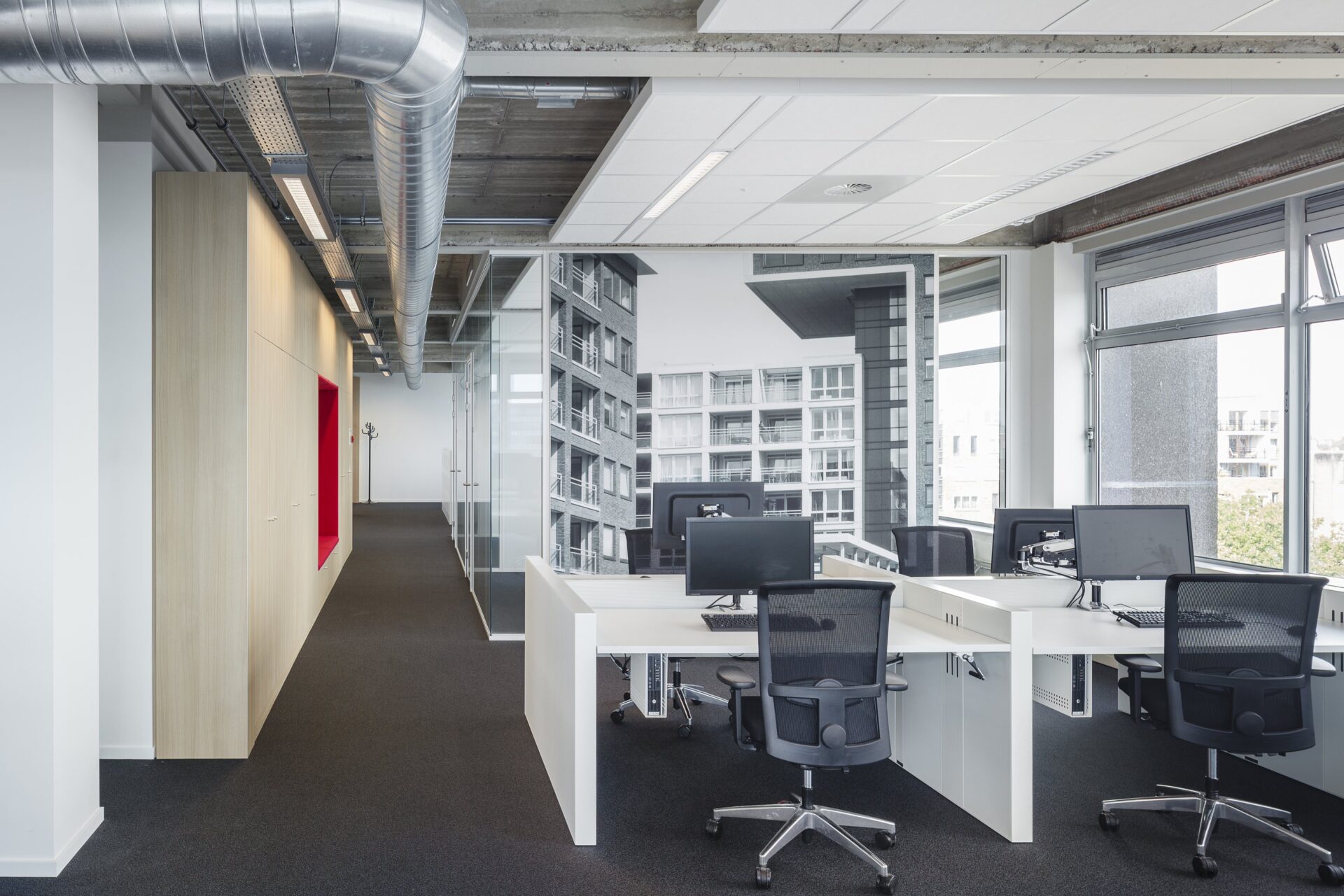 Graphics complement the slightly raw core and shell of the building