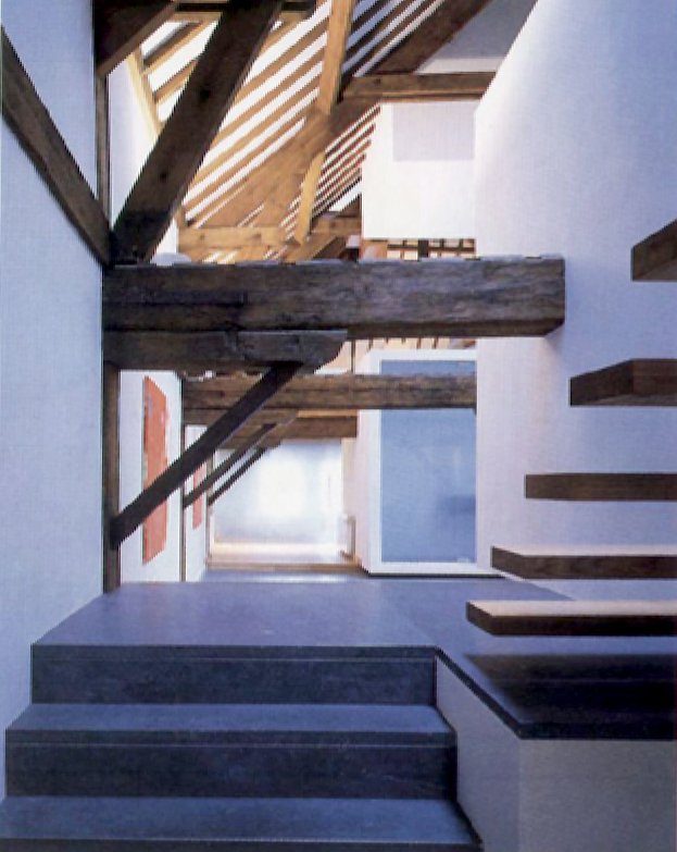 Abstract cubes in the loft with old wooden beams.