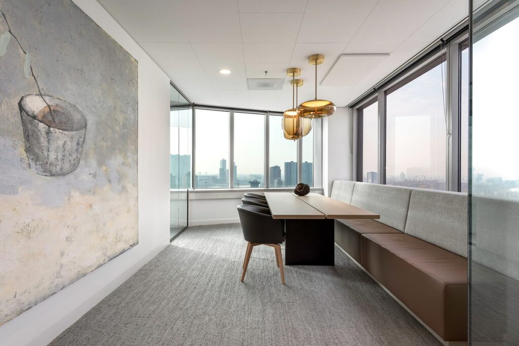 Interior view of the modern office with steel-framed glass doors
