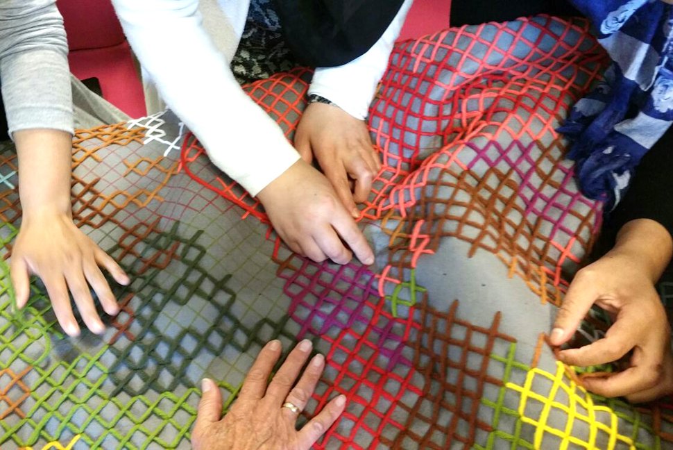 Hand-embroidered felt wall panels in progress